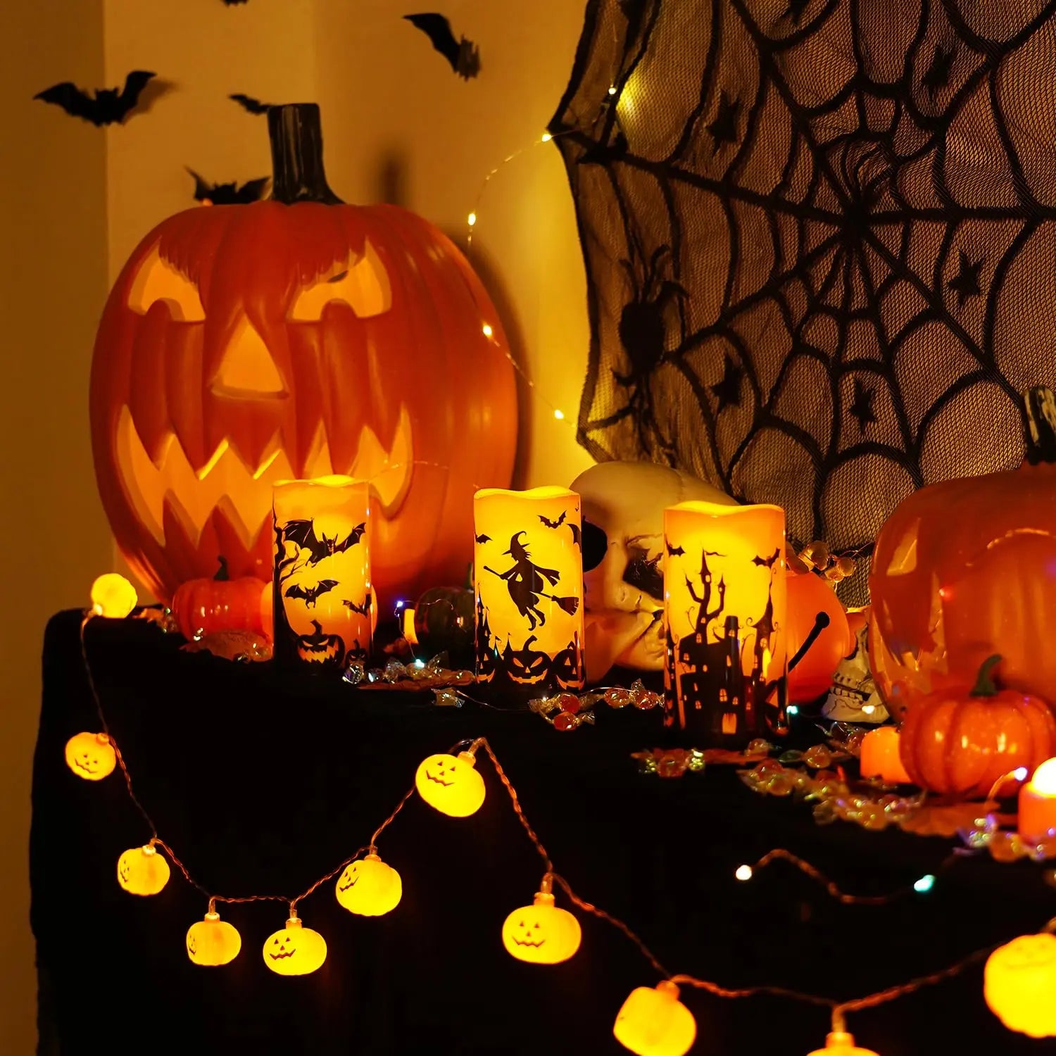 Halloween party table decorated with LED candles